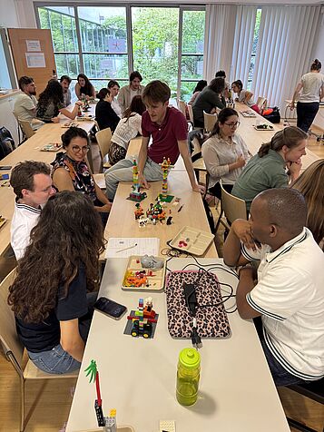Participants discuss their LEGO models