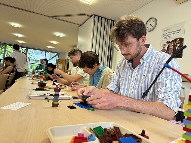 Participant constructing a lego model.