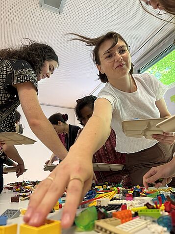 Participants picking lego bricks.